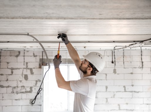 A man working with the wires